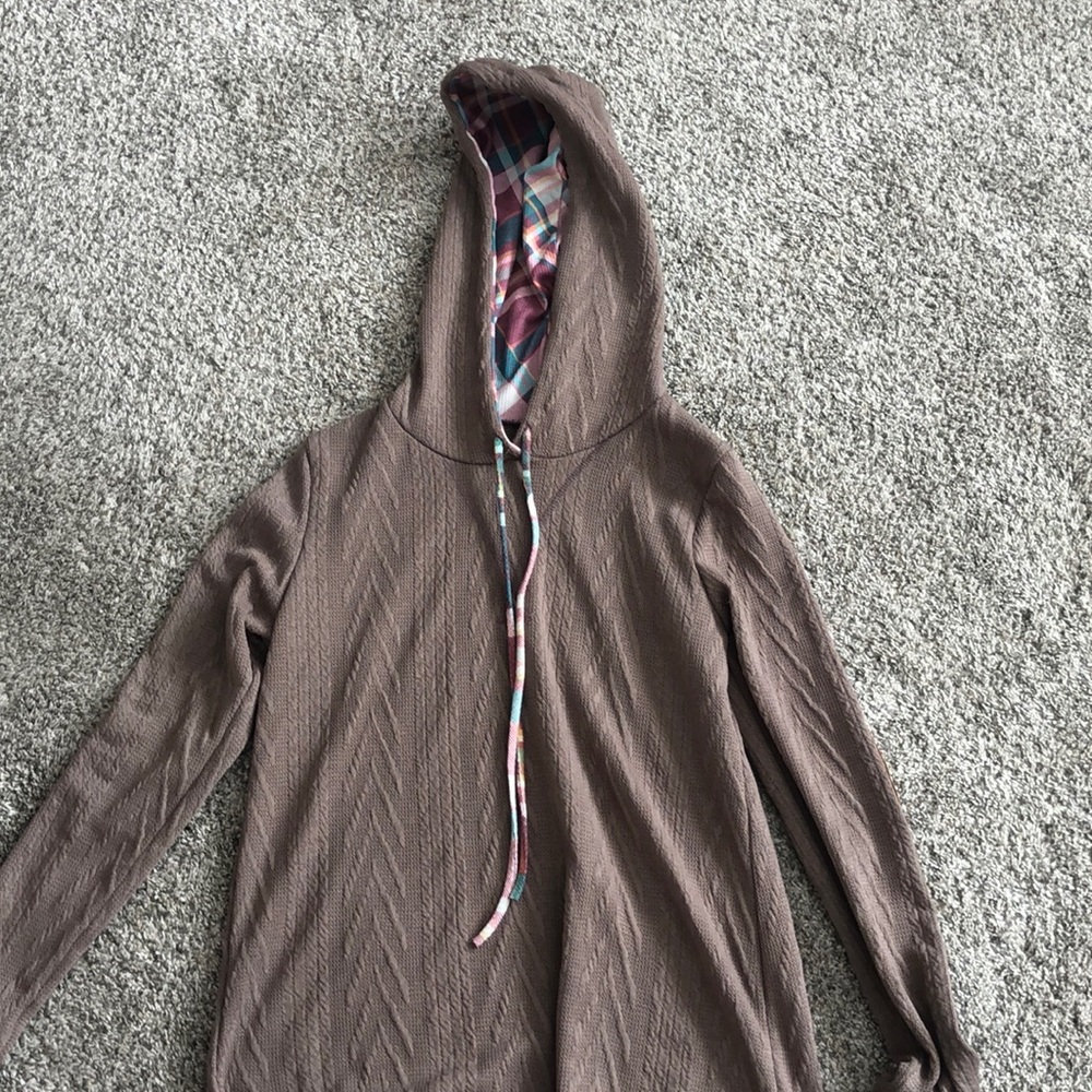 Lavander/pinkish color sweater with cool color design on hood. And elbow pads